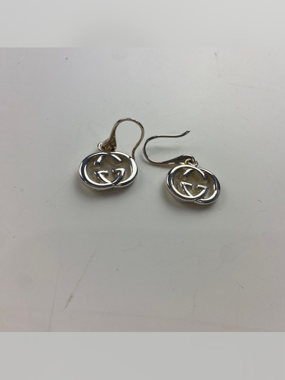 Gucci Polished Silver Interlocking G Drop Earrings